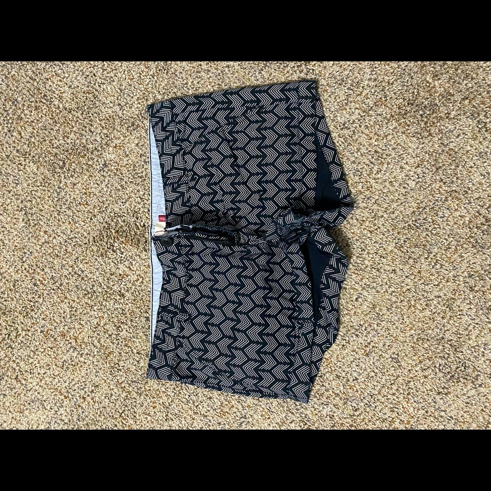 Black shorts with fun pattern. Only worn a couple of times. Now too small for me